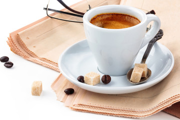 Coffee and newspaper.