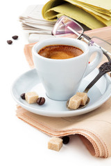 Coffee and newspaper.