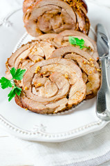 Baked roll from a turkey thigh with a grain mustard
