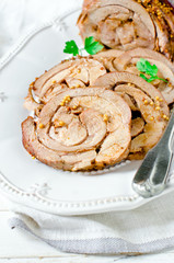 Baked roll from a turkey thigh with a grain mustard