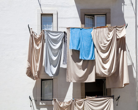Typical Lisbon house with clothes drying on rope in Lisbon, Portugal
