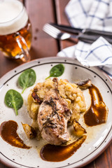 Iberian cutlet with mashes potatoes decoration and draft beere in pub or restaurant