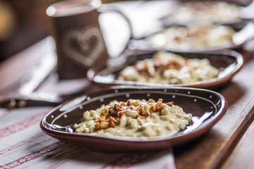 Traditional slovakian food Halusky with fried bacon and decoration