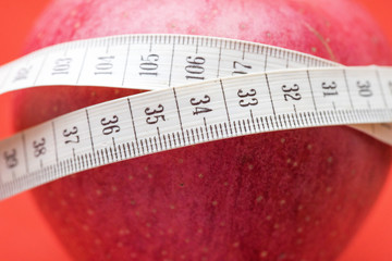 3897673 Apple with White Measuring Tape © Supertrooper