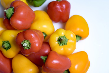 Colorful Bell Peppers in white Background