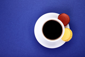 Sweet Dessert Macaron or macaroon with coffee