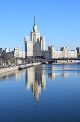 Fototapeta na wymiar A large apartment house on the embankment of the Moscow River was built in 1938-1952; the authors of the project - D. Chechulin, A. Rostkovsky. Moscow, April, 2018