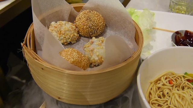red bean sticky rice ball covered with sesame seeds also known as buchi