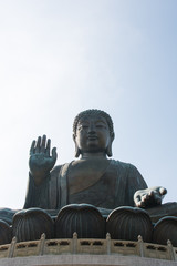 Fototapeta premium The Famous Statue of Tian Tan Buddha located in Ngong Ping Village, Hong Kong