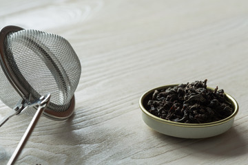 Traditional Chinese black tea and brew sieve