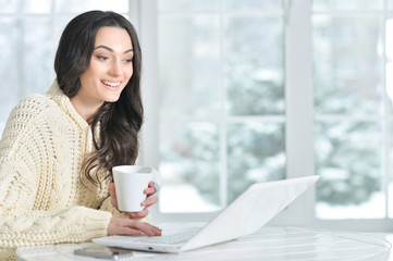 woman using laptop