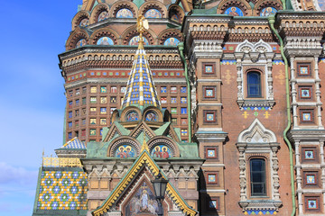 Fototapeta na wymiar Facade Architecture Details of Church of Our Savior on Spilled Blood in St. Petersburg, Russia. Religious Building Ornamental Decor Close Up View, Exterior Facade of Old Historical Russian Cathedral.