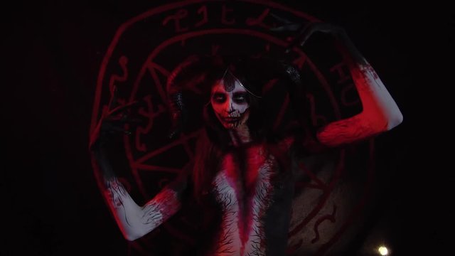 Succubus dances against the background of the pentagram luring its victim, concept art