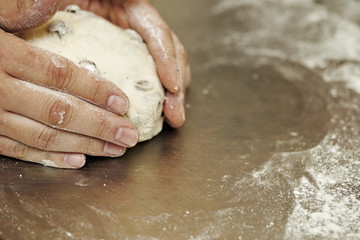 Fototapeta premium Kneading bread dough 