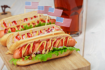 Hot dogs on wooden background