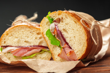 sandwich on a wooden table