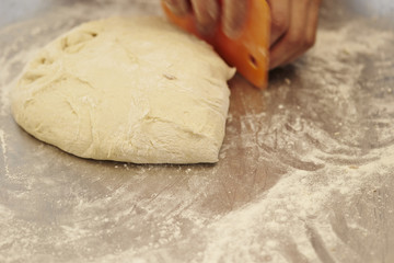 Cutting bread dough 