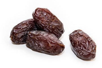 High quality dats on white background (fruits of date palm Phoenix dactylifera)