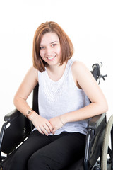 cute disabled young woman smiling sitting in a wheelchair