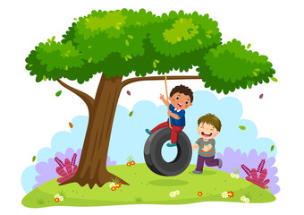 Happy two boys playing tire swing under the tree