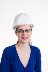 young woman engineer wearing goggles and safety helmet for girl site construction