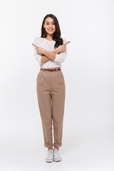 Full length portrait of a smiling asian businesswoman