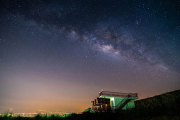 night landscape mountain and green hut milky way  galaxy background , thailand , long exposure , low light