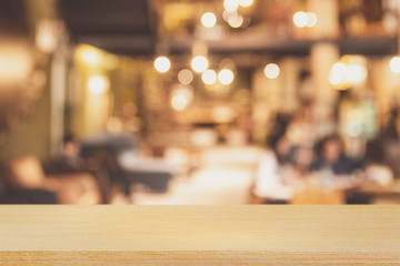 Empty Table top Counter with Blurred People and Restaurant, cafe, or coffee Shop.