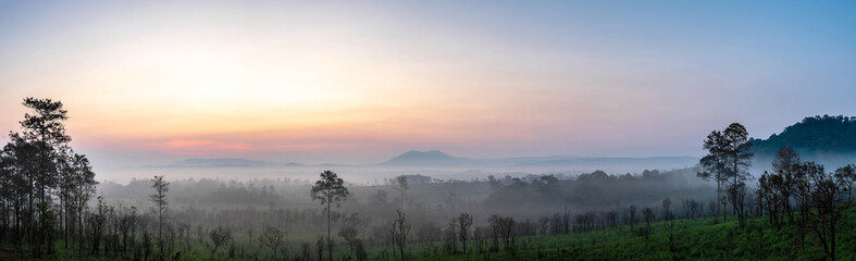 panoramic landscape beautiful mountain on sunrise background and nature mist on forest , panorama Thailand