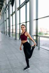 Obraz premium Girl warm up before run.