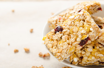 Bars of muesli in a bowl, rustic style. Useful food, dietary, vegetarian breakfast