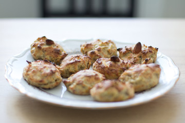 white plate with banana muffins