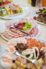 Meat snack beautifully decorated on a festive table