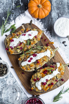 Filled aubergine, bulgur, pumpkin, pomegranate, zucchini, rosemary, tzatziki, mint, vegetables