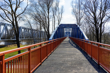 Bridge over the river in spring