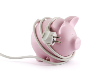 Energy Savings concept. Piggy bank with power plug. Clipping path included. 