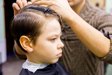 Fototapeta premium kid in barbershop