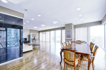 Modern interior in a new luxury house with panoramic windows.