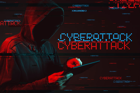 Cyberattack  Concept With Faceless Hooded Male Person