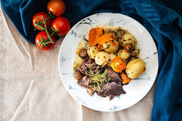 Beef stewed and Carrots potatoes with a wine sauce and herbs