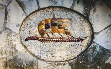 Ancient Roman style mosaic panel of longship with sail and oars in Castle Hill park in Nice, Cote d'Azur, France