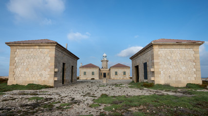 Fototapeta na wymiar Vista del Faro de Punta Nati en Ciutadella Menorca