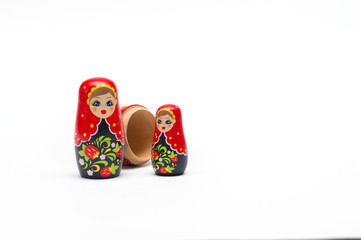 Traditional wooden doll Matreshka (Babushka) isolated on a white background
