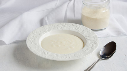 semolina porridge in the white plate