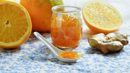 Obraz na płótnie Canvas orange jam with ginger backlit