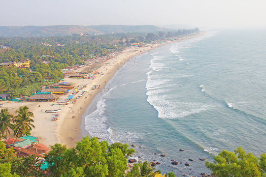 Arambol Beach. View from the sky, from  above, aerophoto, point of view. View of the beach. Long beautiful beach, top view. People walk on the beach, relax on the beach