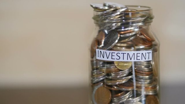 Investment Money Kept In A Jar