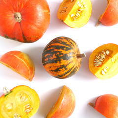 Pumpkins in a cut isolated on a white background. Composition of pumpkins.