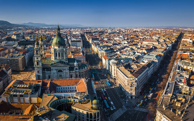 Fototapeta na wymiar Budapest, Hungary - Aerial view of St.Stephen's basilica with Andrassy street and Bajcsy-Zsilinszky street at sunset with clear blue sky