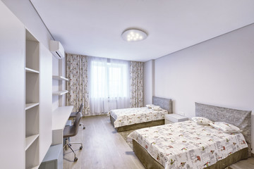 Modern interior of a bedroom in the new house.